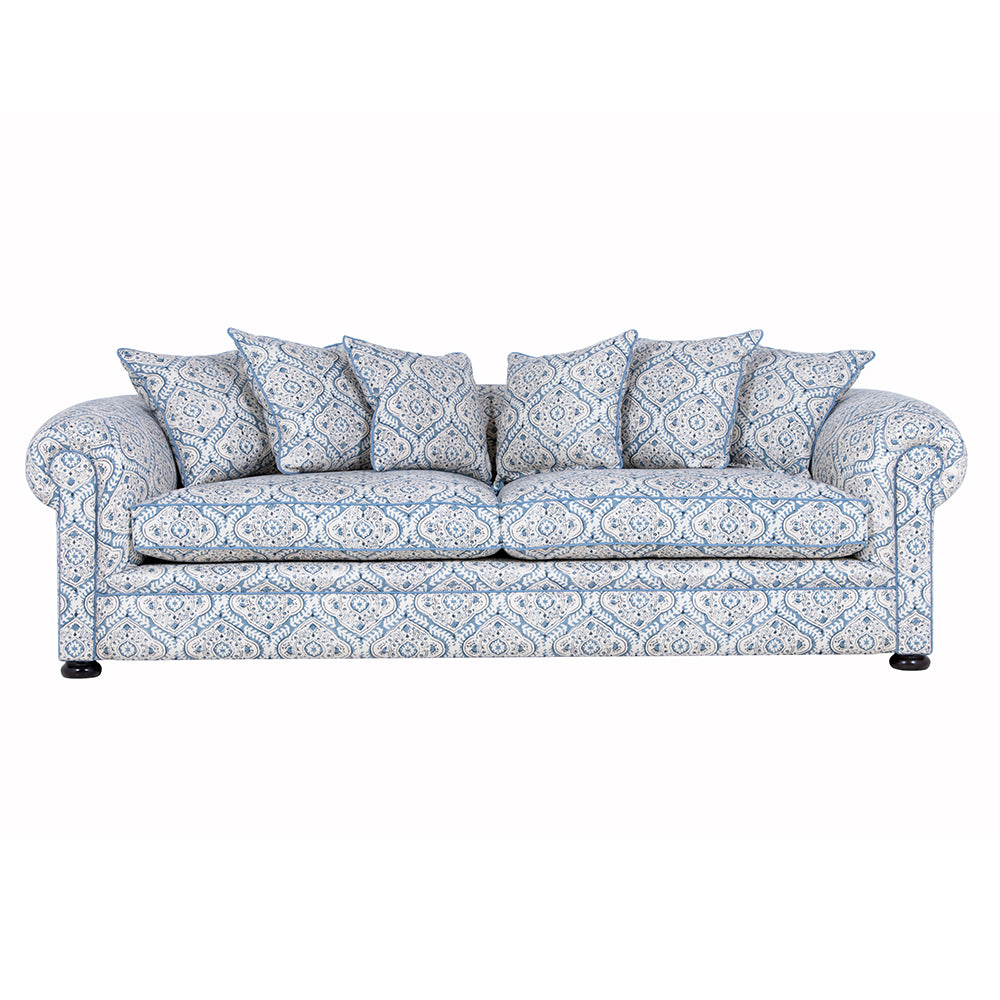 a blue patterend modern chesterfield sofa