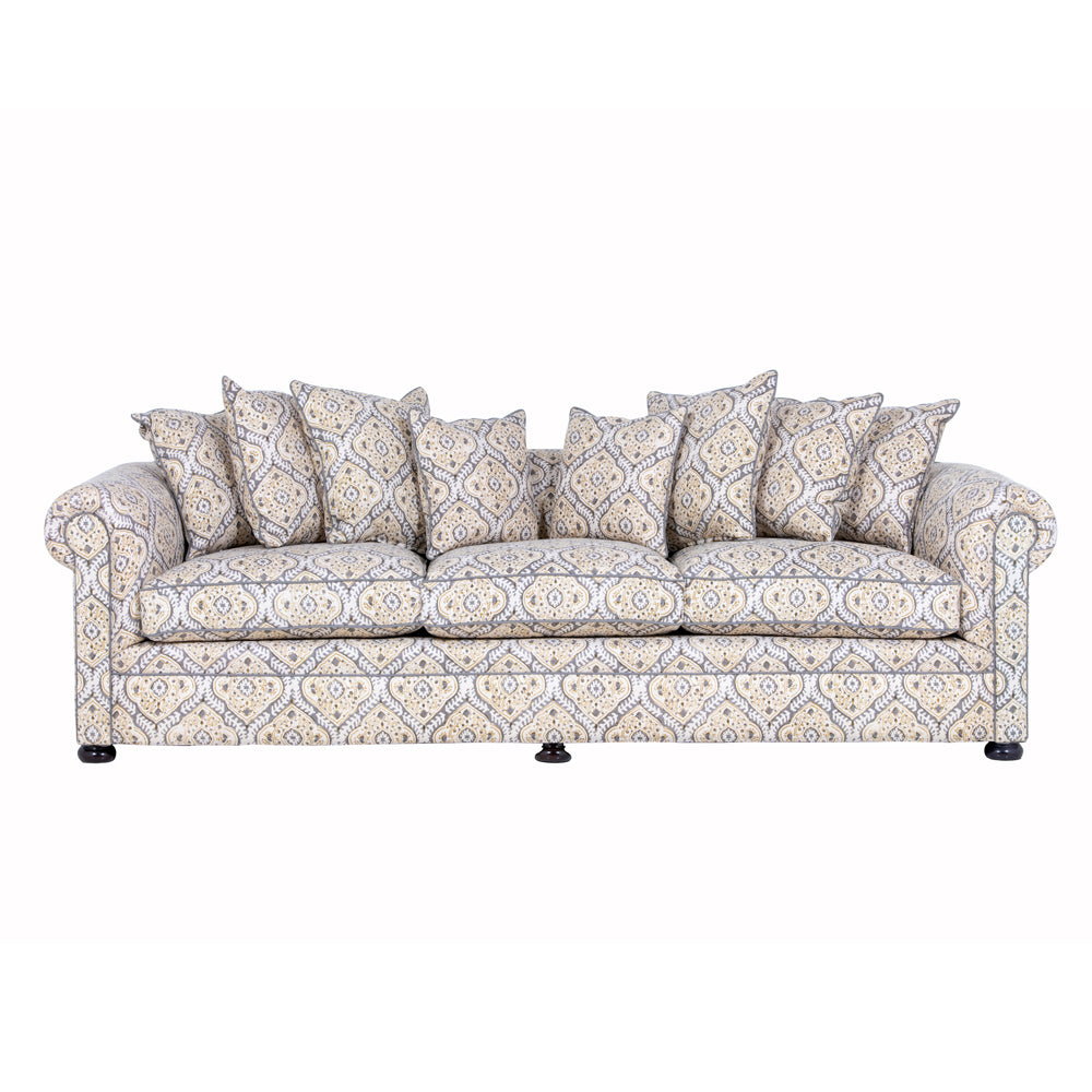 a grey and beige modern chesterfield sofa