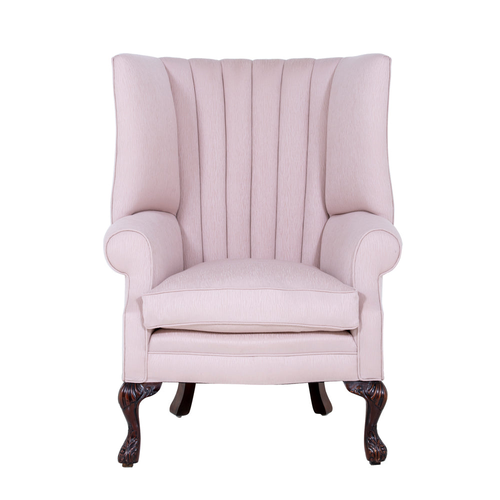 wingchair with fluted back in light pink fabric