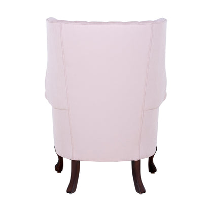 wingchair with fluted back in light pink fabric