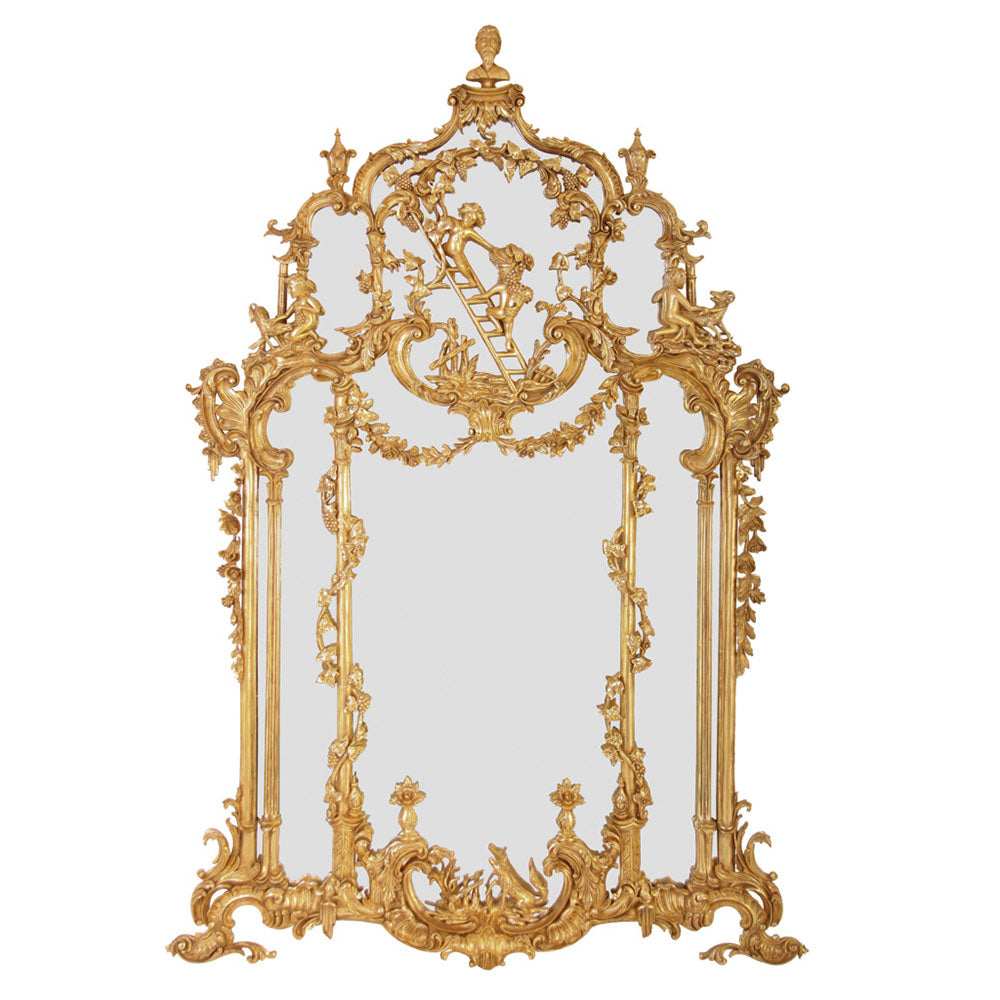 This magnificent Thomas Johnson Gilt Mirror is hand carved on solid mahogany and gilded in gold leaf.  