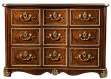 A serpentine mahogany chest of drawers with strapwork marquetry