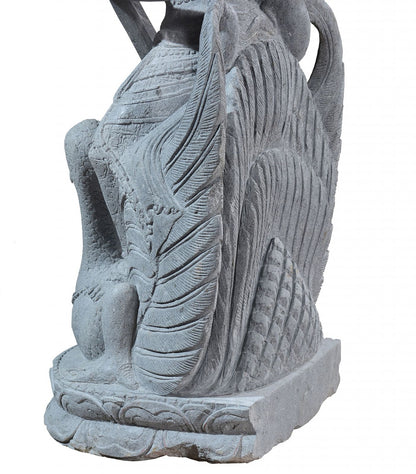 Garden stone statue of hindu goddess Saraswati