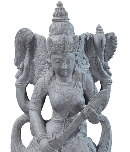 Garden stone statue of hindu goddess Saraswati