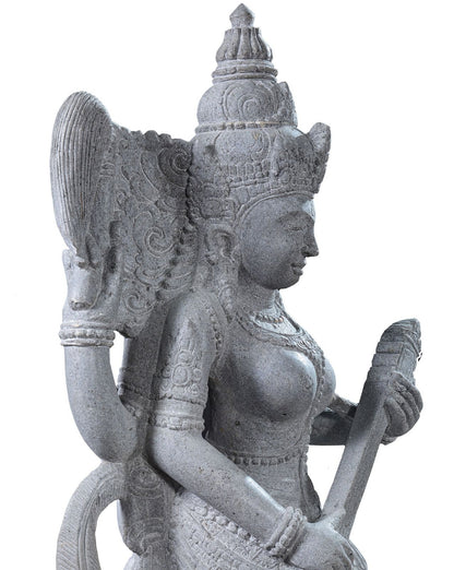 Garden stone statue of hindu goddess Saraswati